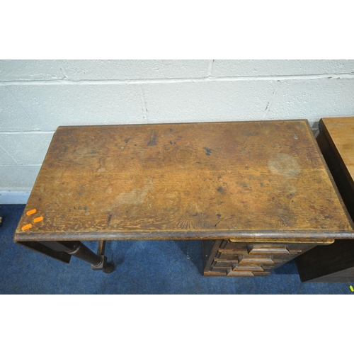 1331 - A 20TH CENTURY FLAME MAHOGANY BOOKCASE, the two glazed doors enclosing two adjustable shelves, above... 