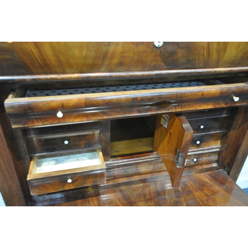 1340 - A 19TH CENTURY FLAME MAHOGANY ESCRITOIRE, with a stepped top, fitted with a single drawer, above a f... 