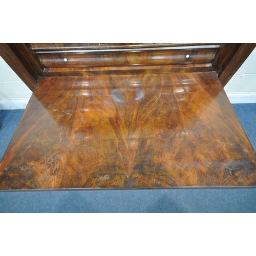 1340 - A 19TH CENTURY FLAME MAHOGANY ESCRITOIRE, with a stepped top, fitted with a single drawer, above a f... 