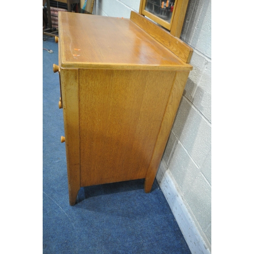 1346 - A 20TH CENTURY LIGHT OAK DRESSING CHEST, in the manner of Heals of London, with a single swing mirro... 