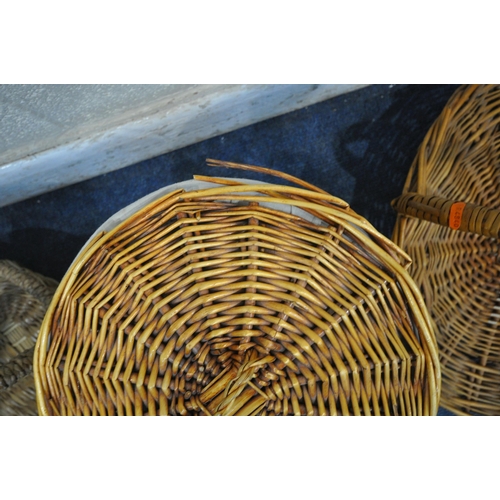 1362 - A SELECTION OF WICKER ITEMS, to include two armchairs, two baskets and a bin (condition report: all ... 