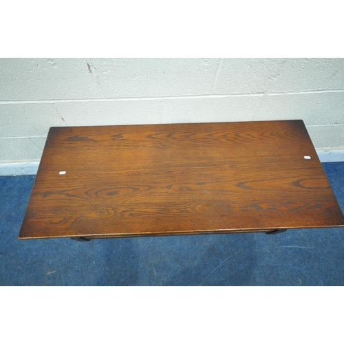 1372 - AN OLD CHARM OAK RECTANGULAR COFFEE TABLE, with a single linenfold door, length 122cm x depth 51cm x... 