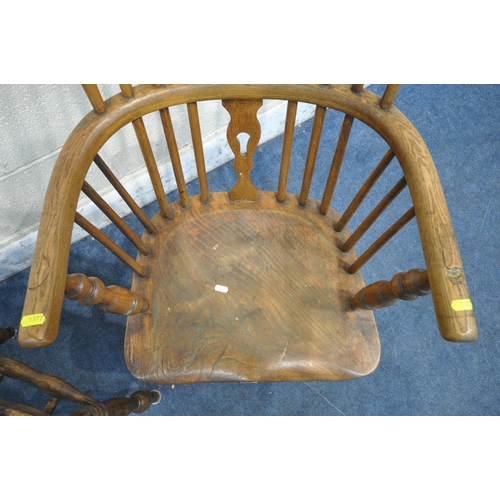 1377 - A 19TH CENTURY ELM SEATED WINDSOR ARMCHAIR, with spindled backrest and a central splat, turned suppo... 