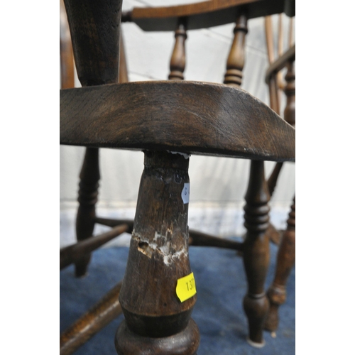 1377 - A 19TH CENTURY ELM SEATED WINDSOR ARMCHAIR, with spindled backrest and a central splat, turned suppo... 