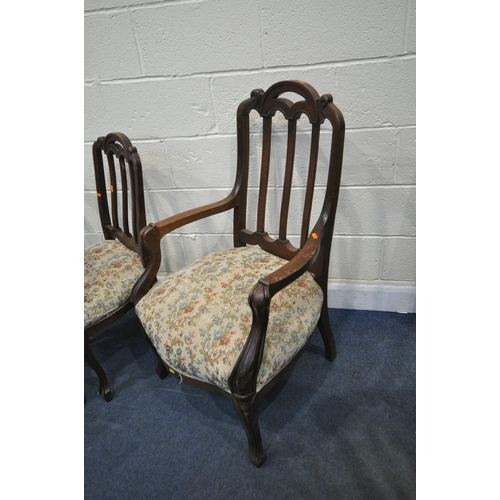 1391 - A 20TH CENTURY MAHOGANY PARTIAL PARLOUR SUITE, comprising two carvers and six chairs, with domed and... 