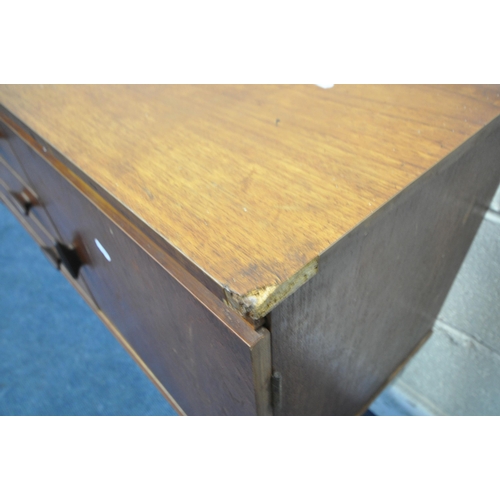 1393 - A MID CENTURY TEAK SIDEBOARD, fitted with two cupboard doors, flanking three drawers, on square tape... 