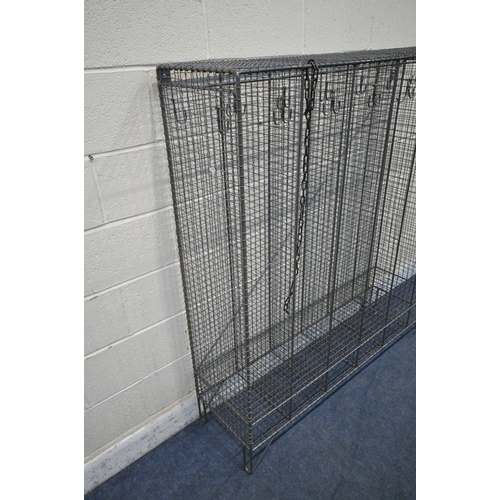 1396 - A WIRE MESH GYM LOCKER, with six tall sections and six small sections, on hair pin legs, width 138cm... 