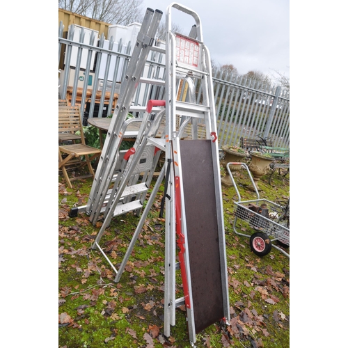 1009 - AN ALUMINIUM DOUBLE EXTENSION LADDER with 7 rungs to each 195cm length, four step ladders and a Youn... 