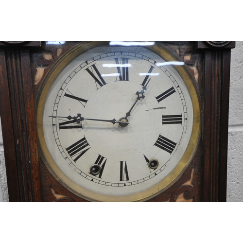 1404 - A 19TH CENTURY MAHOGANY AMERICAN WALL CLOCK, with foliate crest and two finials, the glazed door enc... 