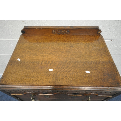 1414 - A 20TH CENTURY OAK CHEST OF FOUR DRAWERS, with a raised back, on shaped front legs, width 75cm x dep... 