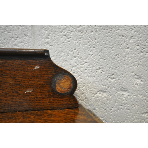 1414 - A 20TH CENTURY OAK CHEST OF FOUR DRAWERS, with a raised back, on shaped front legs, width 75cm x dep... 