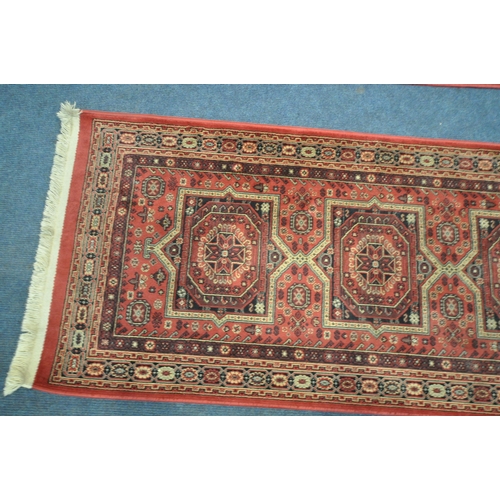 1417 - TWO RED 100% VISCOSE TABRIZ CARPET RUNNERS, 210cm x 65cm (condition report: ideal for a clean) (2)