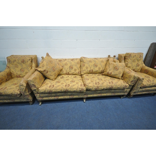 1426 - A HIGH QUALITY GOLD AND FLORAL UPHOLSTERED THREE PIECE LOUNGE SUITE, comprising large knole two seat... 