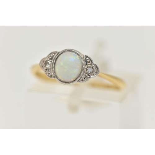 102 - A YELLOW METAL OPAL AND DIAMOND RING, set with a central oval opal cabochon, flanked with single cut... 