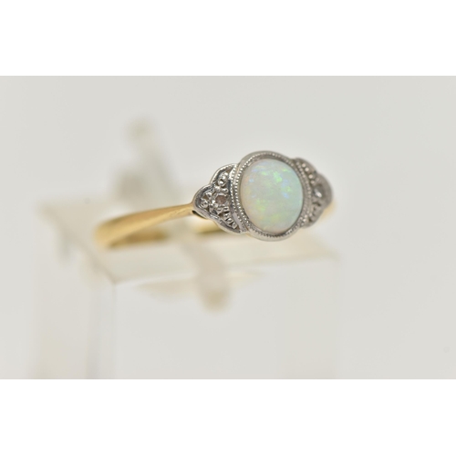 102 - A YELLOW METAL OPAL AND DIAMOND RING, set with a central oval opal cabochon, flanked with single cut... 