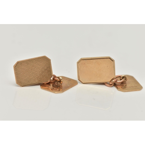 121 - A PAIR OF 9CT GOLD CUFFLINKS, rectangular panels with cut off corners, one panel with an engine turn... 