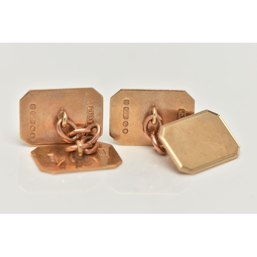 121 - A PAIR OF 9CT GOLD CUFFLINKS, rectangular panels with cut off corners, one panel with an engine turn... 