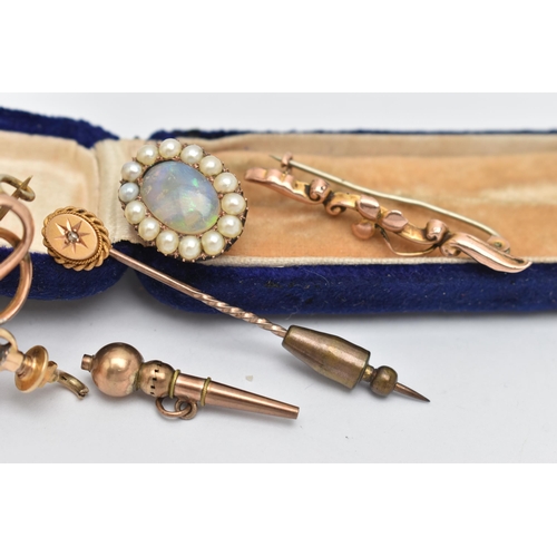 132 - A SELECTION OF JEWELLERY, to include a small brooch, of an oval form, set with a central opal caboch... 
