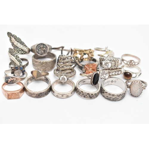 137 - AN ASSORTMENT OF WHITE METAL RINGS, to include a signed 'Swarovski' band ring, sixteen white metal r... 