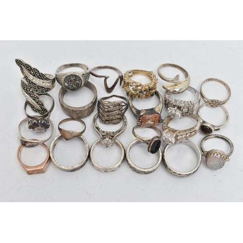 137 - AN ASSORTMENT OF WHITE METAL RINGS, to include a signed 'Swarovski' band ring, sixteen white metal r... 