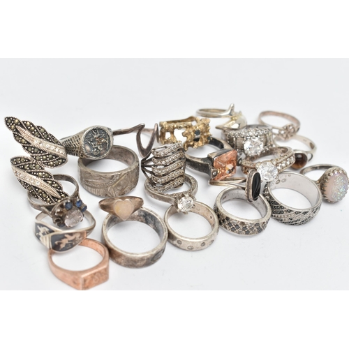 137 - AN ASSORTMENT OF WHITE METAL RINGS, to include a signed 'Swarovski' band ring, sixteen white metal r... 