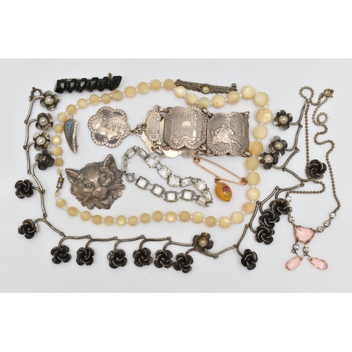 144 - A SMALL ASSORMENT OF JEWELLERY, to include a jet bar brooch, a mother of pearl beaded necklace, a wh... 