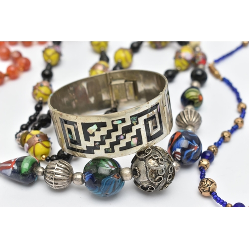 145 - A SMALL ASSORTMENT OF JEWELLERY, to include a signed 'Jewelcraft' necklace, with a native American d... 