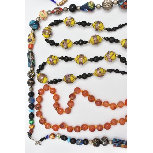 145 - A SMALL ASSORTMENT OF JEWELLERY, to include a signed 'Jewelcraft' necklace, with a native American d... 