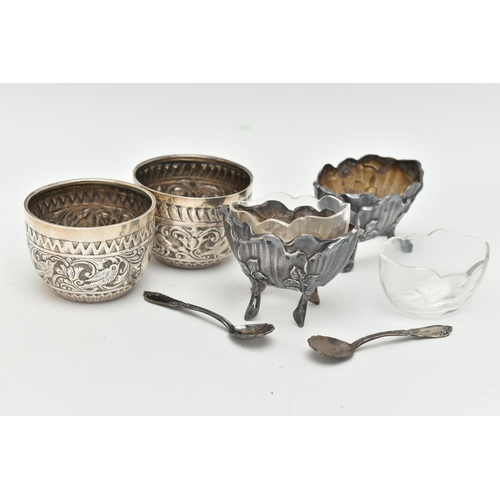 153 - A PAIR OF VICTORIAN SILVER CIRCULAR SALTS, repoussé decorated with a band of birds, foliate scrolls ... 