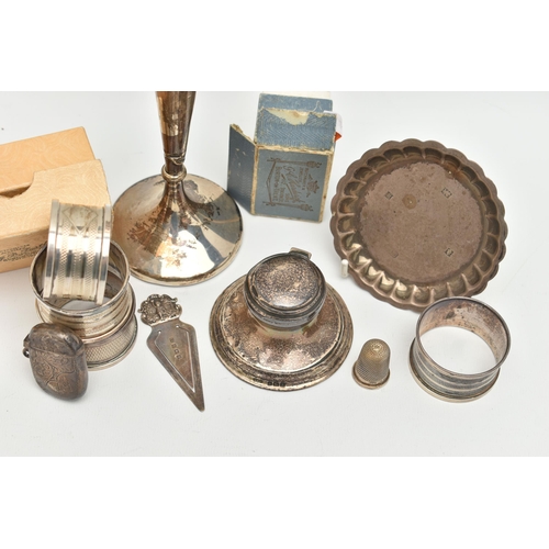 154 - A PARCEL OF SILVER, comprising a harlequin set of three George V circular silver napkin rings, maker... 