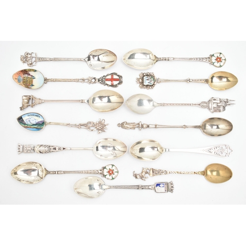 155 - AN ASSORTMENT OF SILVER AND WHITE METAL SPOONS, to include four silver souvenir spoons, all with Bri... 