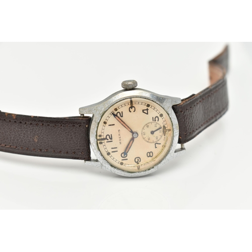 20 - A GENTS MILITARY 'MOERIS' WRISTWATCH, manual wind, round discolored silver dial signed 'Moeris', Ara... 