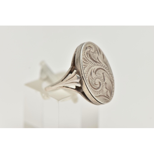 32 - A WHITE METAL POISON STYLE RING, oval form with etched acanthus detail, shank stamped silver, ring s... 