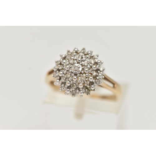 37 - A 9CT GOLD DIAMOND CLUSTER RING, twenty two, single cut diamonds prong set in white gold, leading on... 