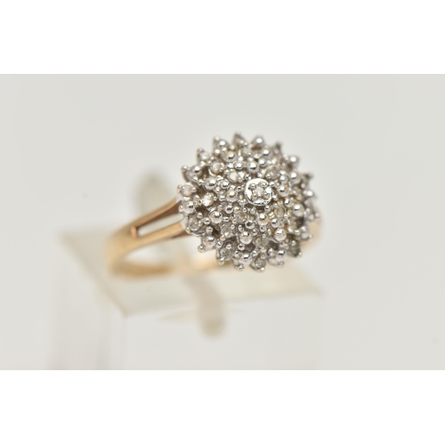 37 - A 9CT GOLD DIAMOND CLUSTER RING, twenty two, single cut diamonds prong set in white gold, leading on... 