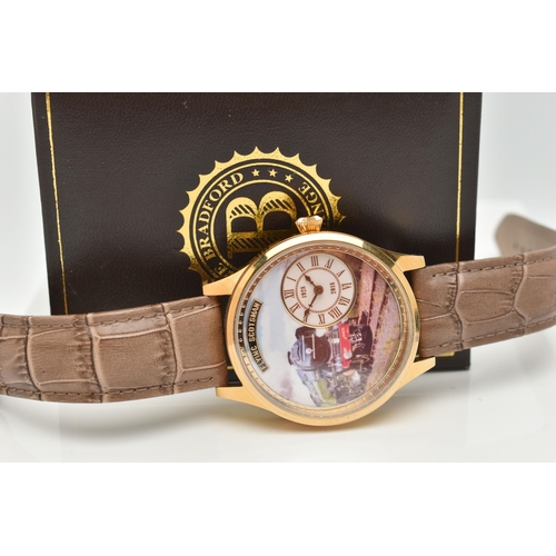 40 - A BOXED NOVELTY WRISTWATCH, quartz movement, round dial depicting the Flying Scotsman, small Roman n... 