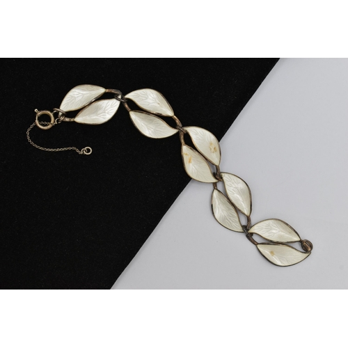 5 - A NORWEIGAN ENAMEL BRACELET, a white metal leaf design bracelet, white guilloche enamel detail to th... 