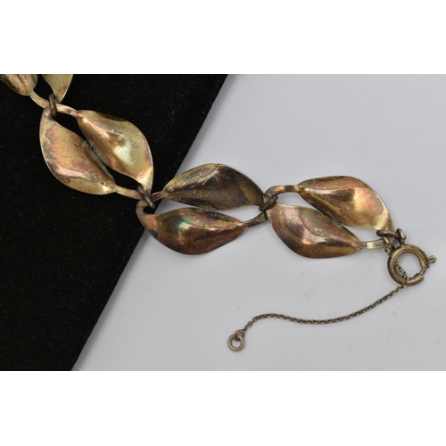 5 - A NORWEIGAN ENAMEL BRACELET, a white metal leaf design bracelet, white guilloche enamel detail to th... 