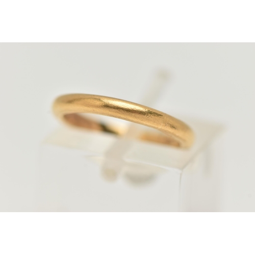 69 - A YELLOW METAL POLISHED BAND RING, band width 2.2mm, unmarked, makers mark 'J.P.T', ring size G, app... 