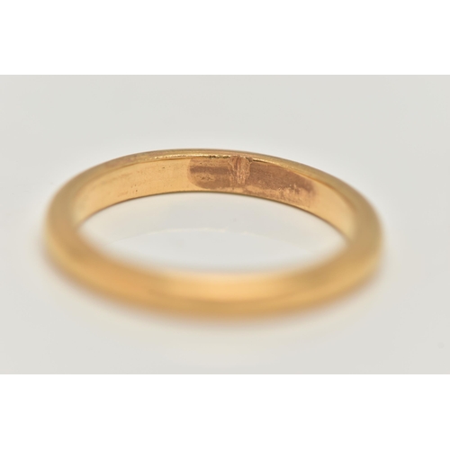 69 - A YELLOW METAL POLISHED BAND RING, band width 2.2mm, unmarked, makers mark 'J.P.T', ring size G, app... 