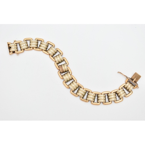 74 - A MODERN WHITE AND YELLOW METAL BRACELET, designed as a series of fifteen white metal grooved links,... 