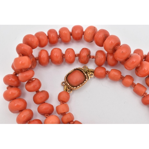 85 - A CORAL BEAD NECKLACE, designed as a series of approximately one hundred and four graduating coral b... 