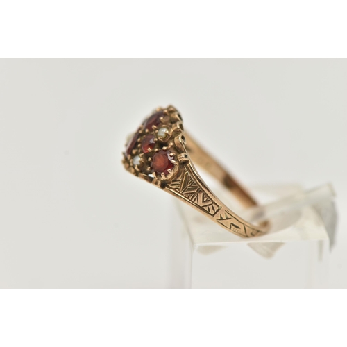 94 - A 9CT GOLD GARNET AND SPLIT PEARL RING, set with six circular cut garnets and four split pearl accen... 