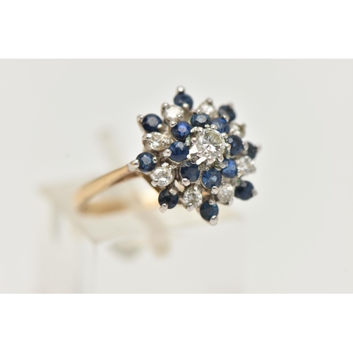 97 - A 9CT SAPPHIRE AND DIAMOND CLUSTER RING, tiered cluster, set with a central round brilliant cut diam... 