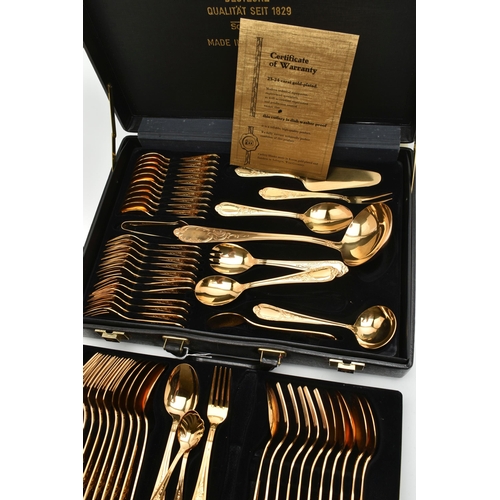 196 - A 'SOLINGEN' BRIEFCASE CANTEEN, 23-24 carat gold-plated cutlery, twelve person table setting, with e... 