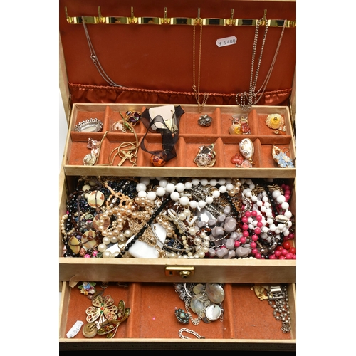 211 - A LARGE ASSORTMENT OF COSTUME JEWELLERY, to include a multi storage jewellery box, tins and boxes of... 