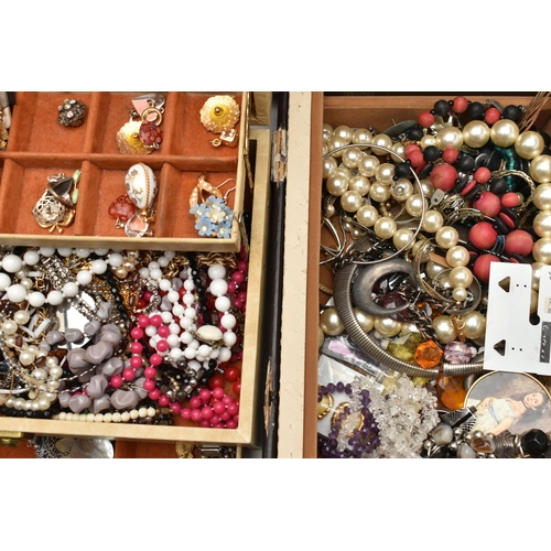 211 - A LARGE ASSORTMENT OF COSTUME JEWELLERY, to include a multi storage jewellery box, tins and boxes of... 