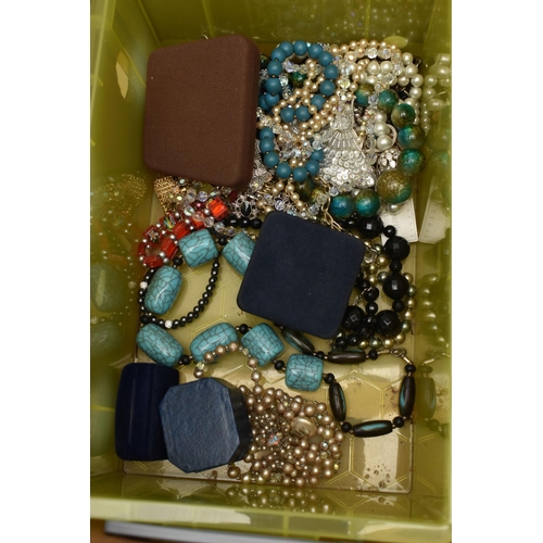 211 - A LARGE ASSORTMENT OF COSTUME JEWELLERY, to include a multi storage jewellery box, tins and boxes of... 