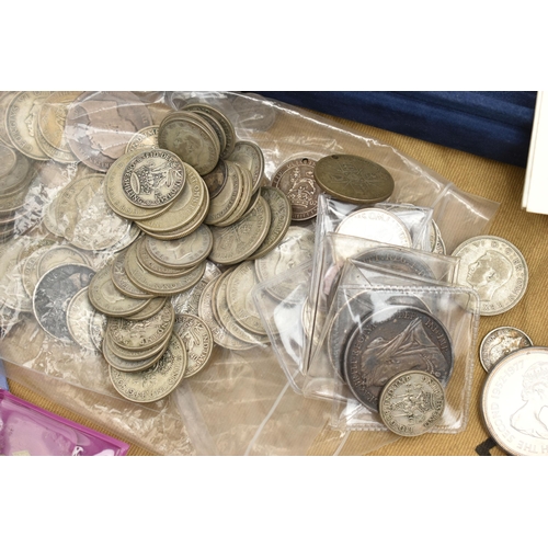 219 - A CARDBOARD BOX OF MIXED COINS, to include a bag of mixed silver content coins approximately 750 gra... 