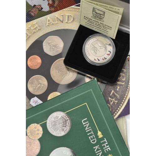 220 - A LARGE BOX CONTAINING COINS COIN COVERS ETC, to include 4x coin covers albums, some feature the Mil... 